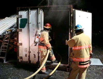 FF Participating in Trapped Drill